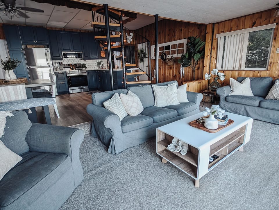 Living room/kitchen. 
*please note the spiral staircase leading to two  bedrooms