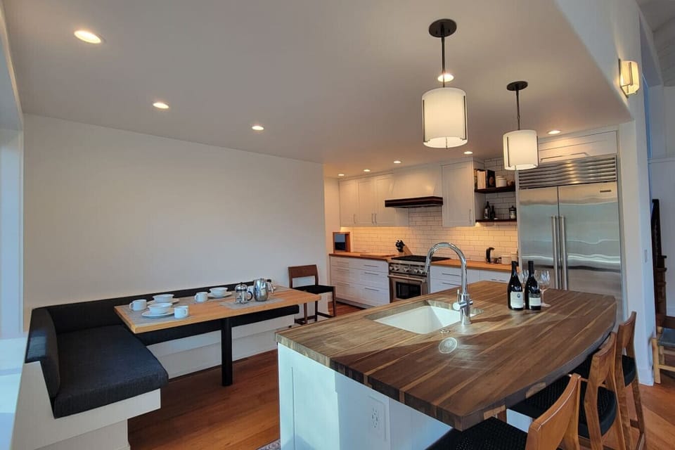 Gourmet kitchen with breakfast nook, coffee grinder, French press coffee maker