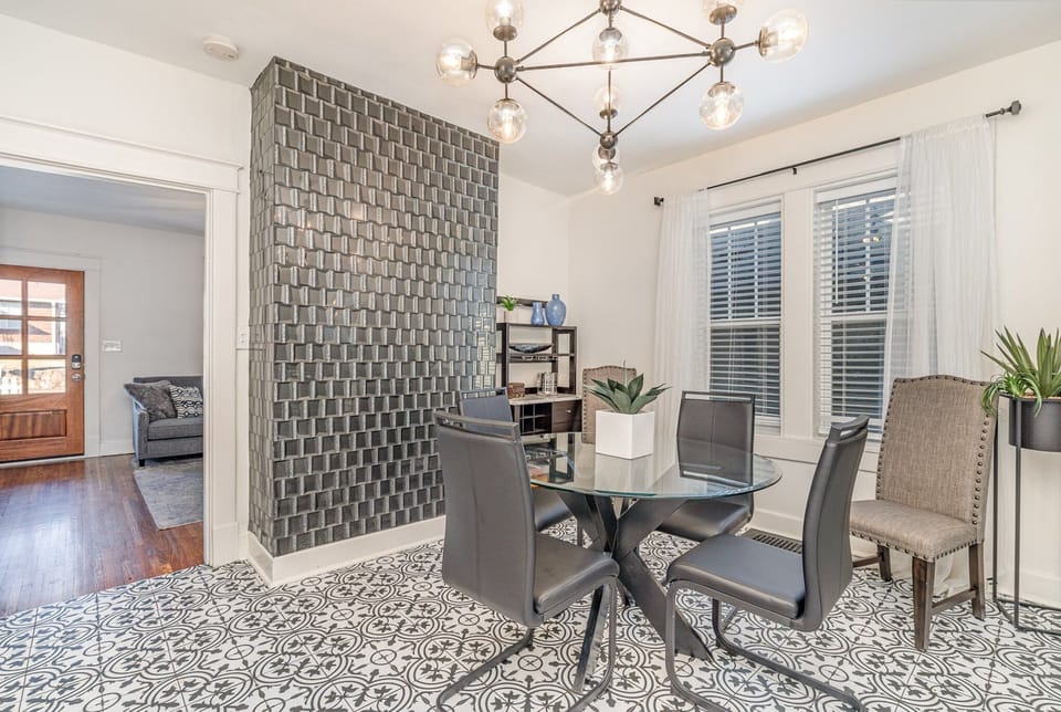Dining Area with seating for 4 guests between the living area and kitchen.