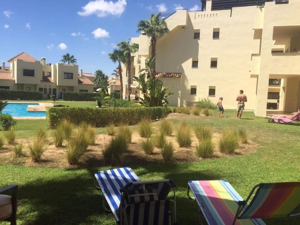 Garden area to sunbathe, metres from swimming pool