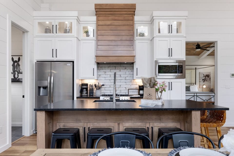 Modern amenities meet rustic charm in our kitchen.