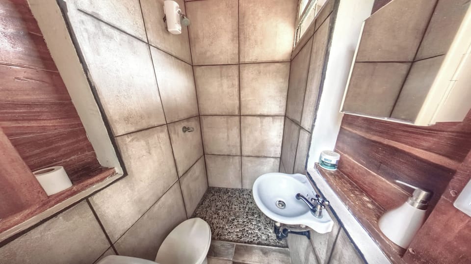 This is the private bathroom just steps outside the door to Casita 3.  Its private for you only.   We have another bathroom on the property as well that you can use thats about 20 steps away in the Main House.