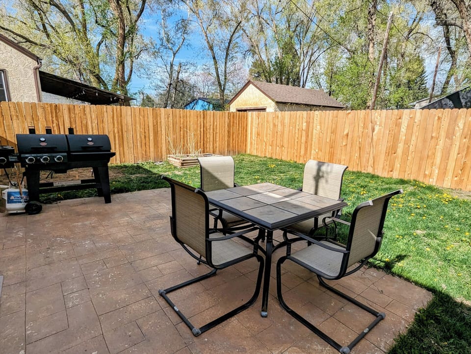 Outdoor table with comfortable chairs.