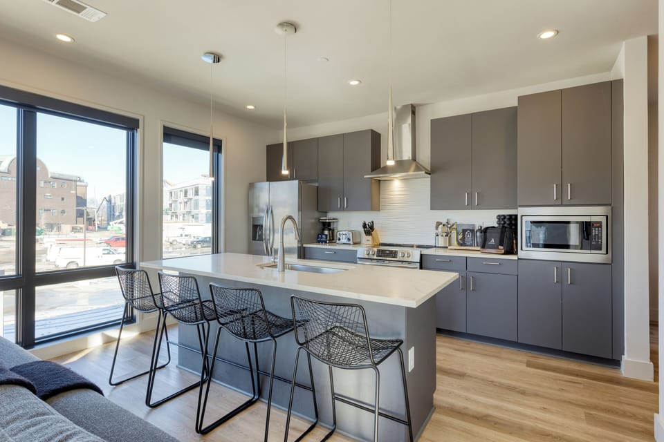 Sleek, fully equipped kitchen.