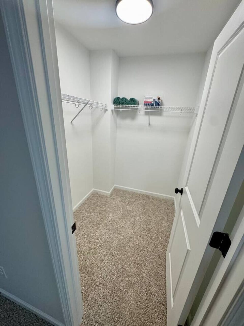 Walk-in closet in the primary bedroom.