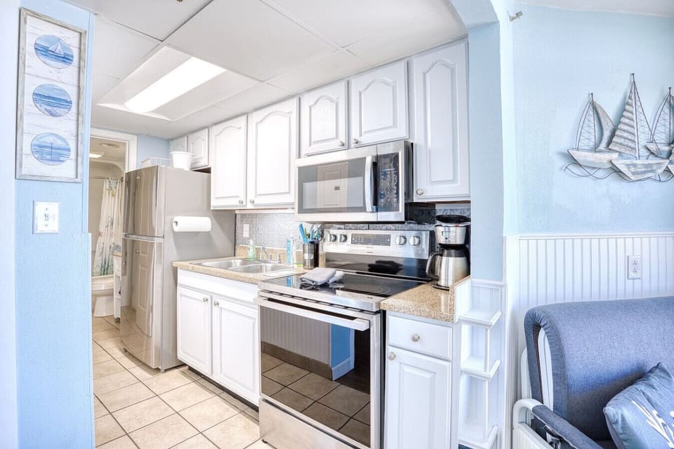 This fully equipped kitchen is stocked with all the essentials. Serve up a family meal while on vacation as if you were at home. This kitchen has the cookware, modern appliances, and dinnerware that will make whipping up those meals simple.