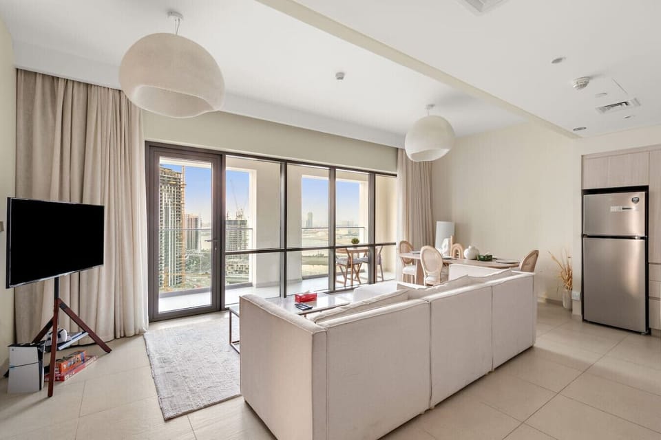 Living Room: Experience Dubai`s skyline from a stylish space with modern decor and vibrant views!