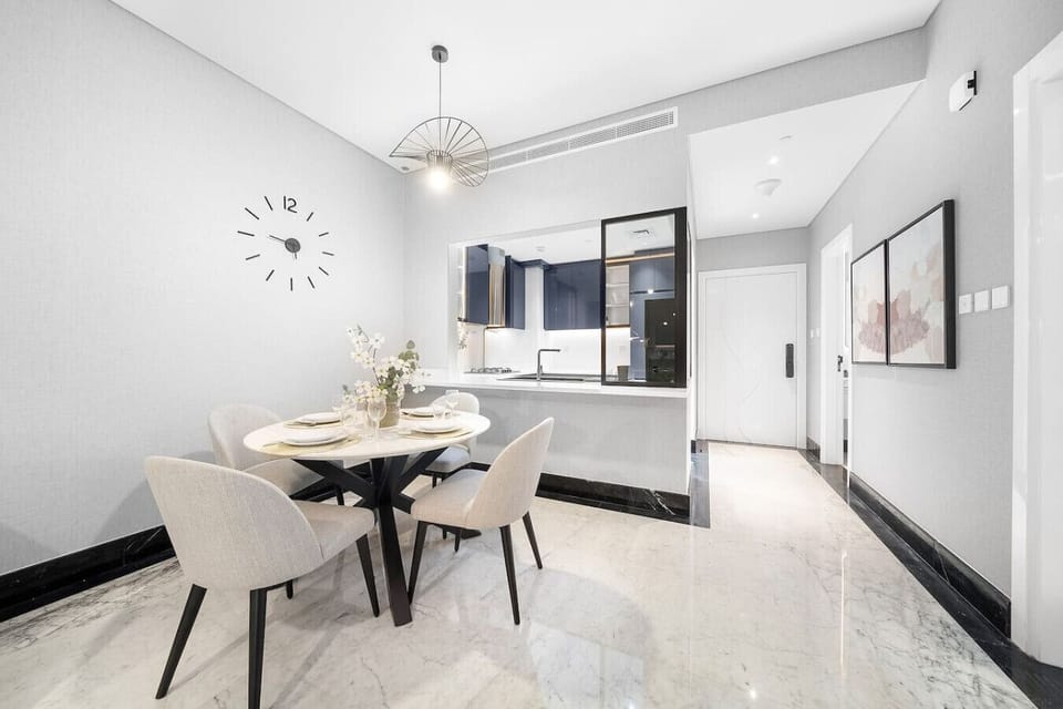 Dining Nook: Enjoy meals in style with this elegant table and beautiful open kitchen view!