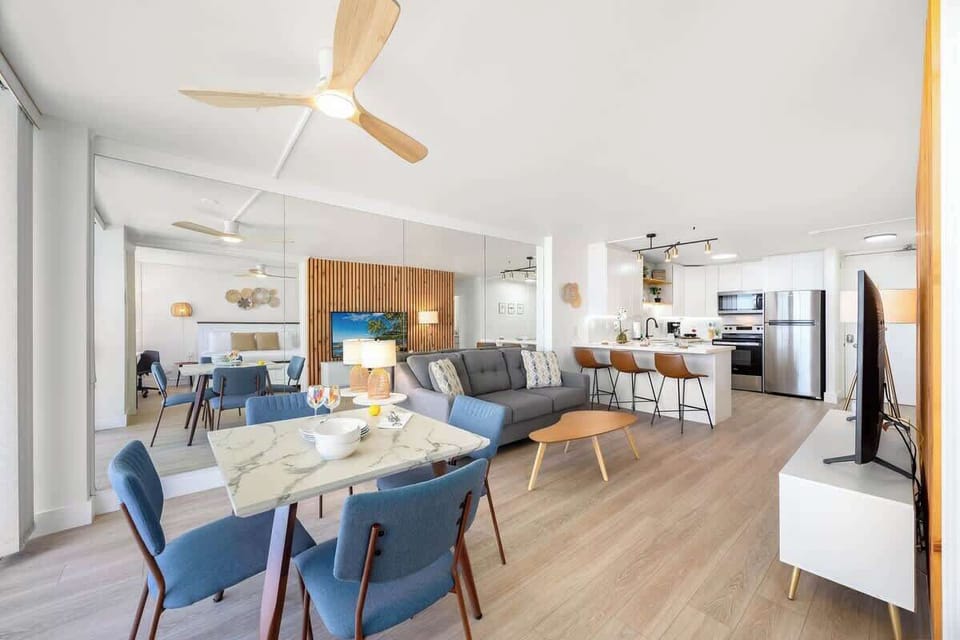 Overview of the dining area, living area, and kitchen