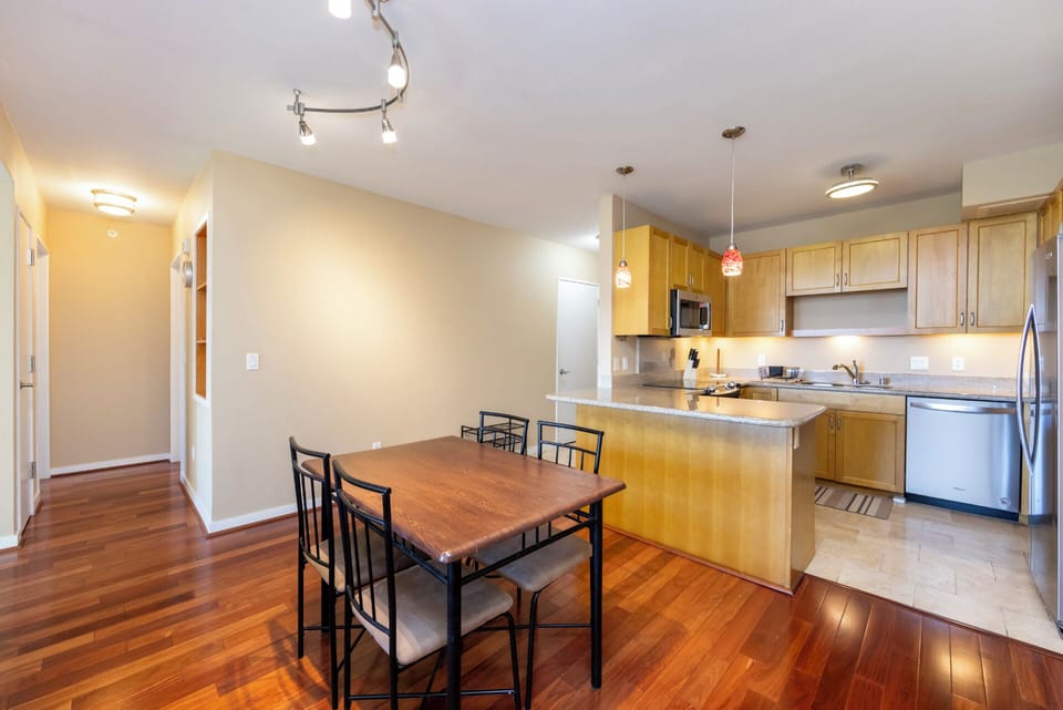 kitchen and dining area - Fully-equipped kitchen for all your cooking needs and dining area that seats four.