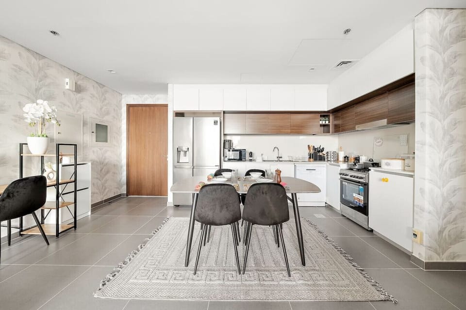 Modern Kitchen: Cook up a feast in this stylish space with sleek appliances and chic decor!