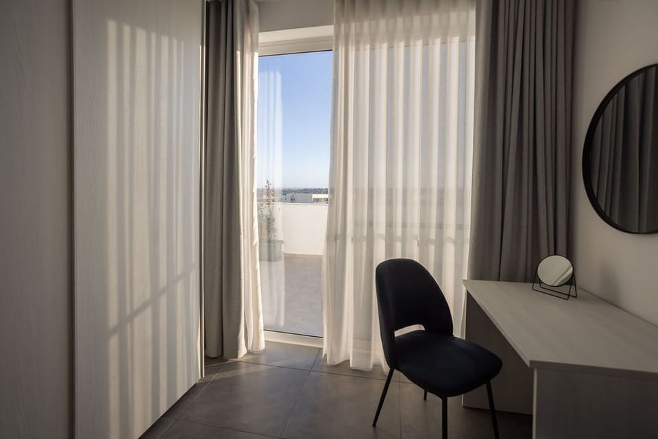 Single bedroom leading onto the terrace