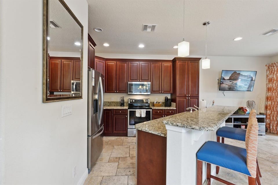 Fully equipped kitchen with ample cabinet space