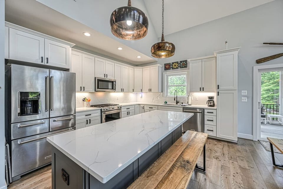 Prepare delicious meals in the fully stocked kitchen—perfect for family and friends.