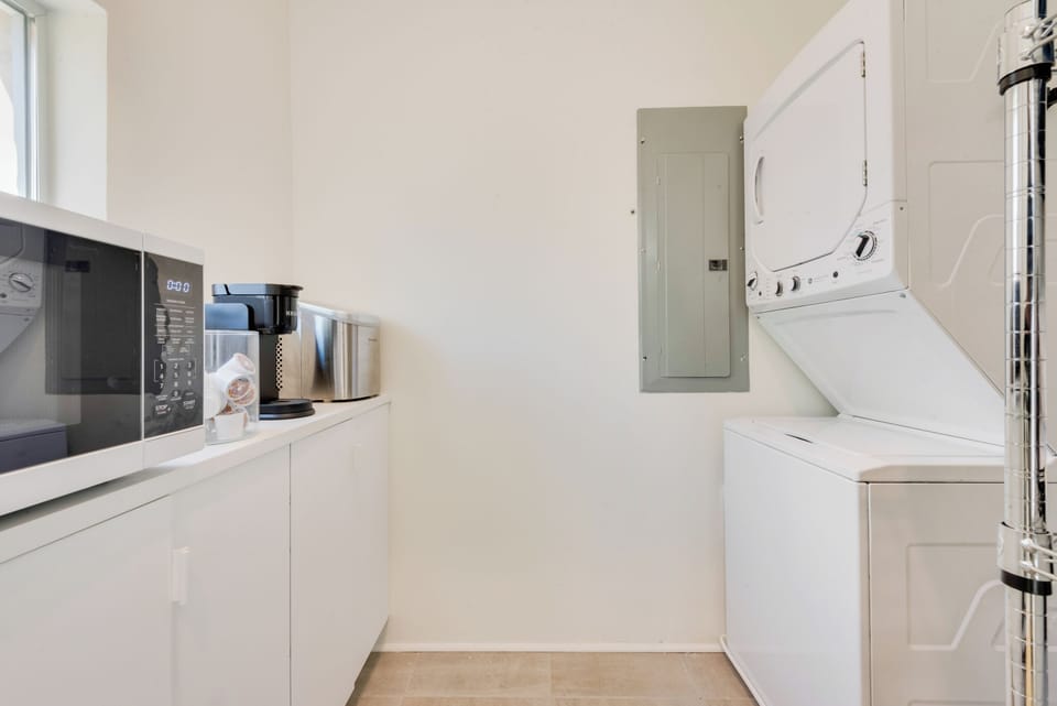 Laundry room with Washer, Drier, microwave, keurig coffee maker and ice maker!