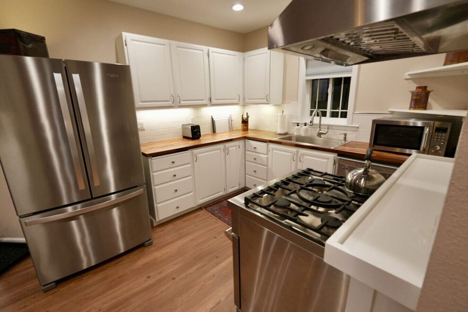 Fully stocked kitchen to enjoy a home cooked meal- convenient Produce stand just down the road