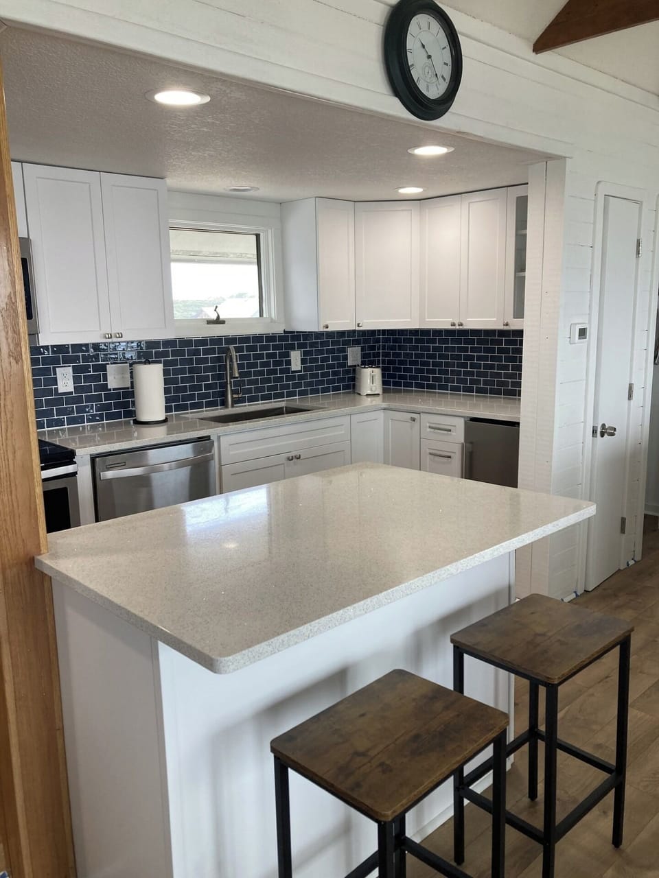 New cabinets, countertop, and backsplash