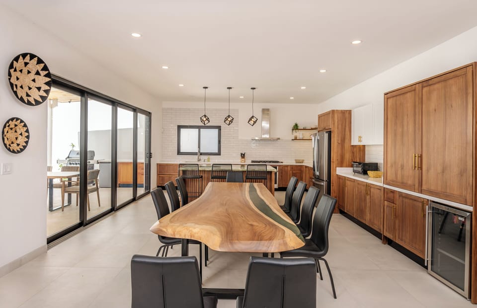 Dining area and view into Large Modern Kitchen