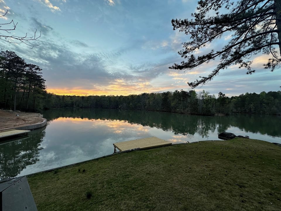 Sunset over the quiet cove with plenty of room to swim and explore.