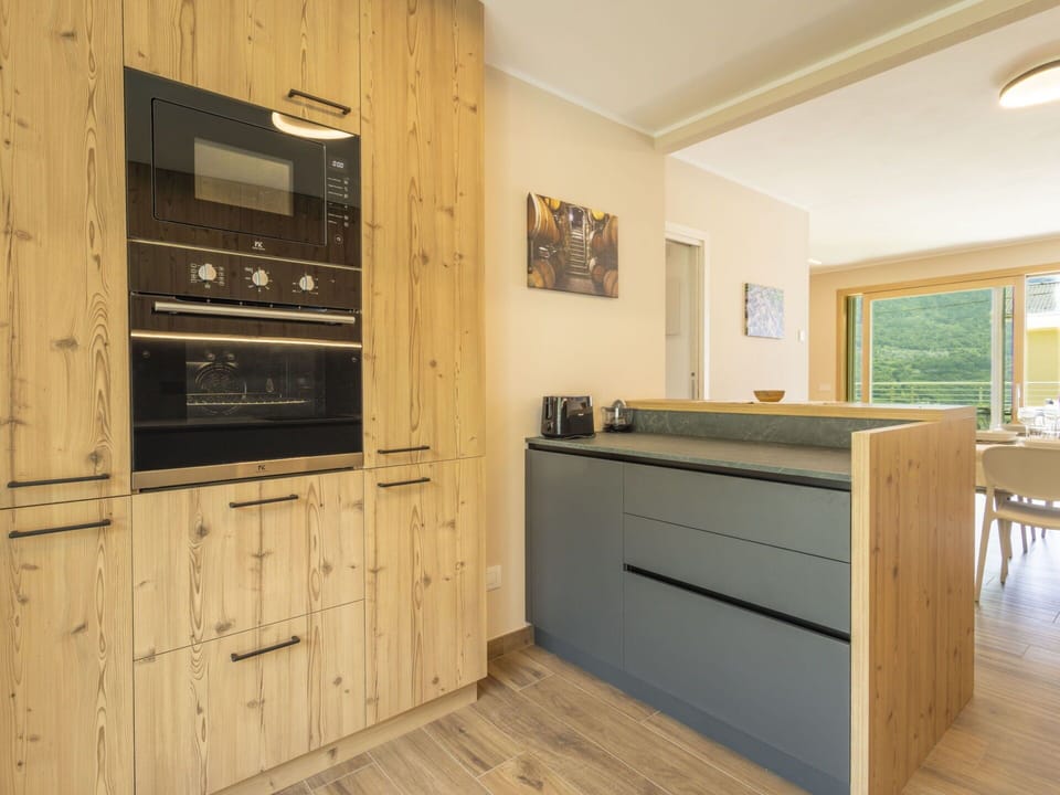 Wood, Flooring, Kitchen, Interior Design, Cabinetry, Countertop, Floor, Furniture, Home Appliance, Wood Flooring