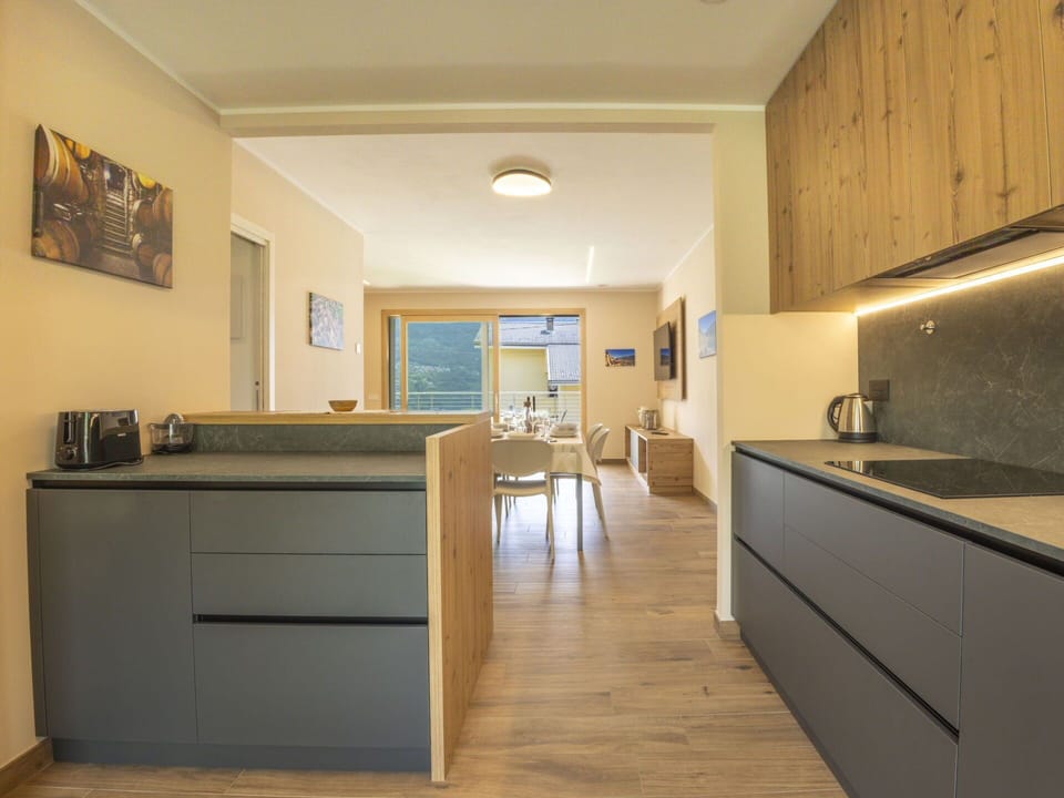 Countertop, Interior Design, Kitchen, Flooring, Wall, Furniture, Cabinetry, Ceiling, Floor, Wood