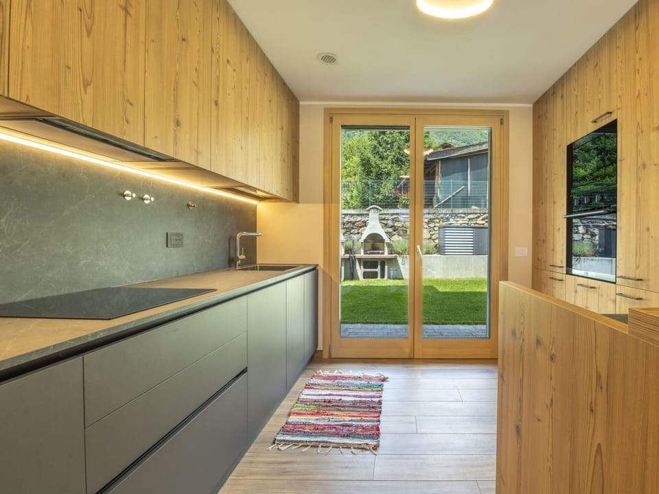 Wood, Flooring, Interior Design, Kitchen, Ceiling, Countertop, Floor, Wood Stain, Cabinetry, Hardwood