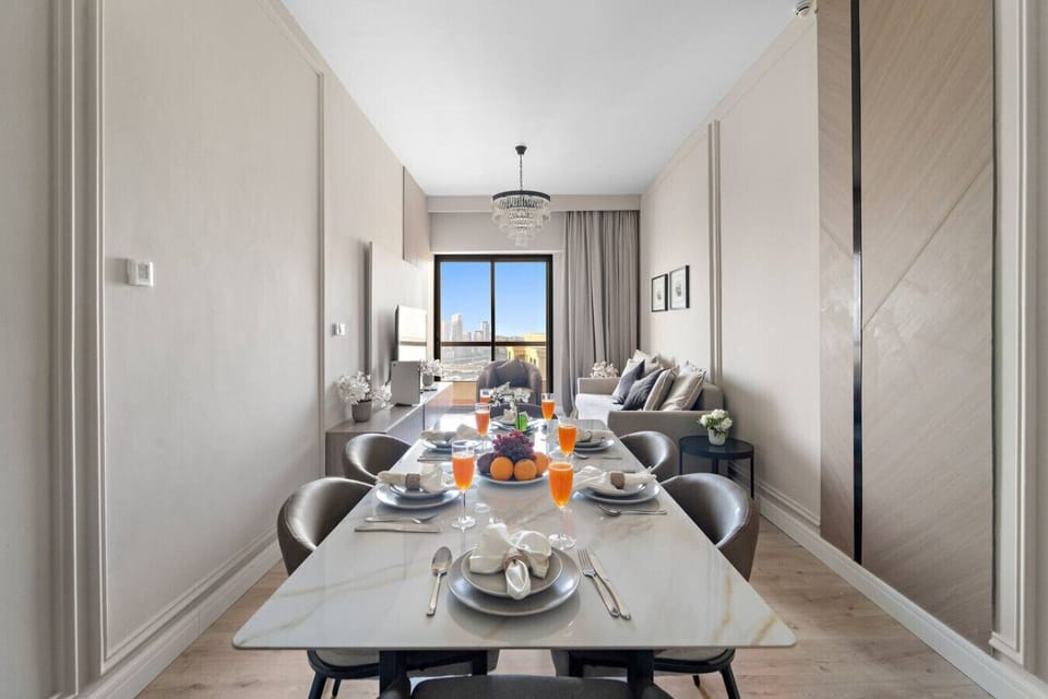 Dining Room: Relax in style with vibrant city views and elegant décor for memorable meals!