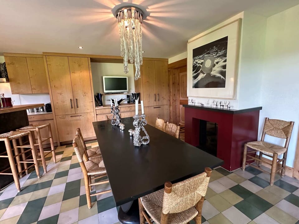 dinning table next to the fire place 