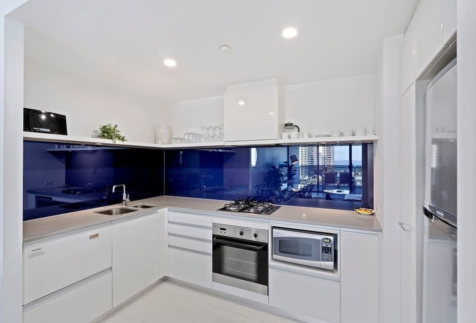 Spacious kitchen with modern appliances, stocked with cookware, dishware, and utensils/cutlery. Please note that we do not provide food items such as salt/pepper/oil. 