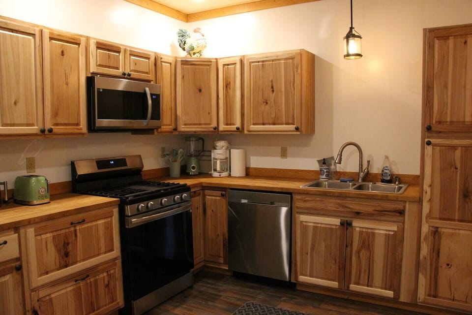 Toaster, coffee pot, tea kettle with complimentary coffee and tea.