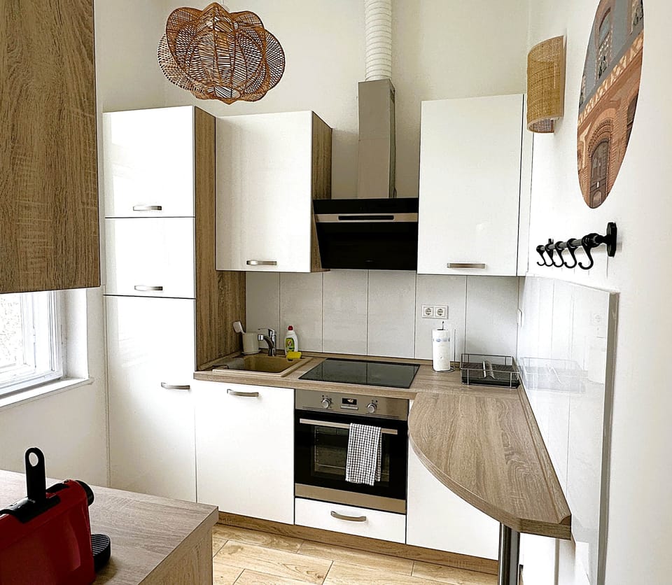 Fitted kitchen with courtyard view
