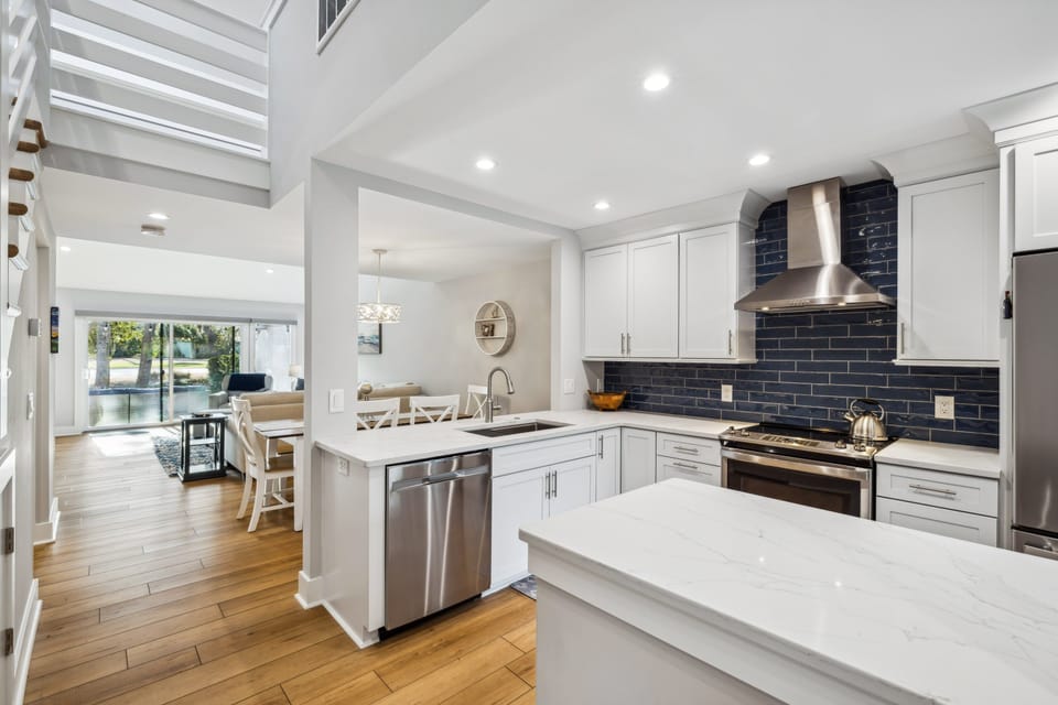 Fully stocked kitchen with stainless steel appliances