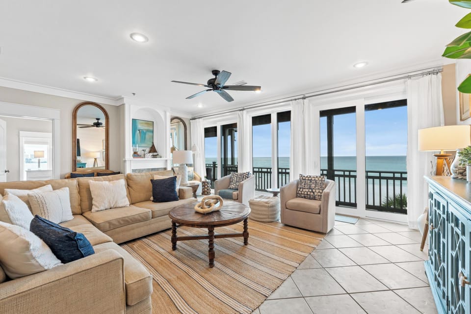 Luxury Gulf-front living room where family memories and sunsets shine