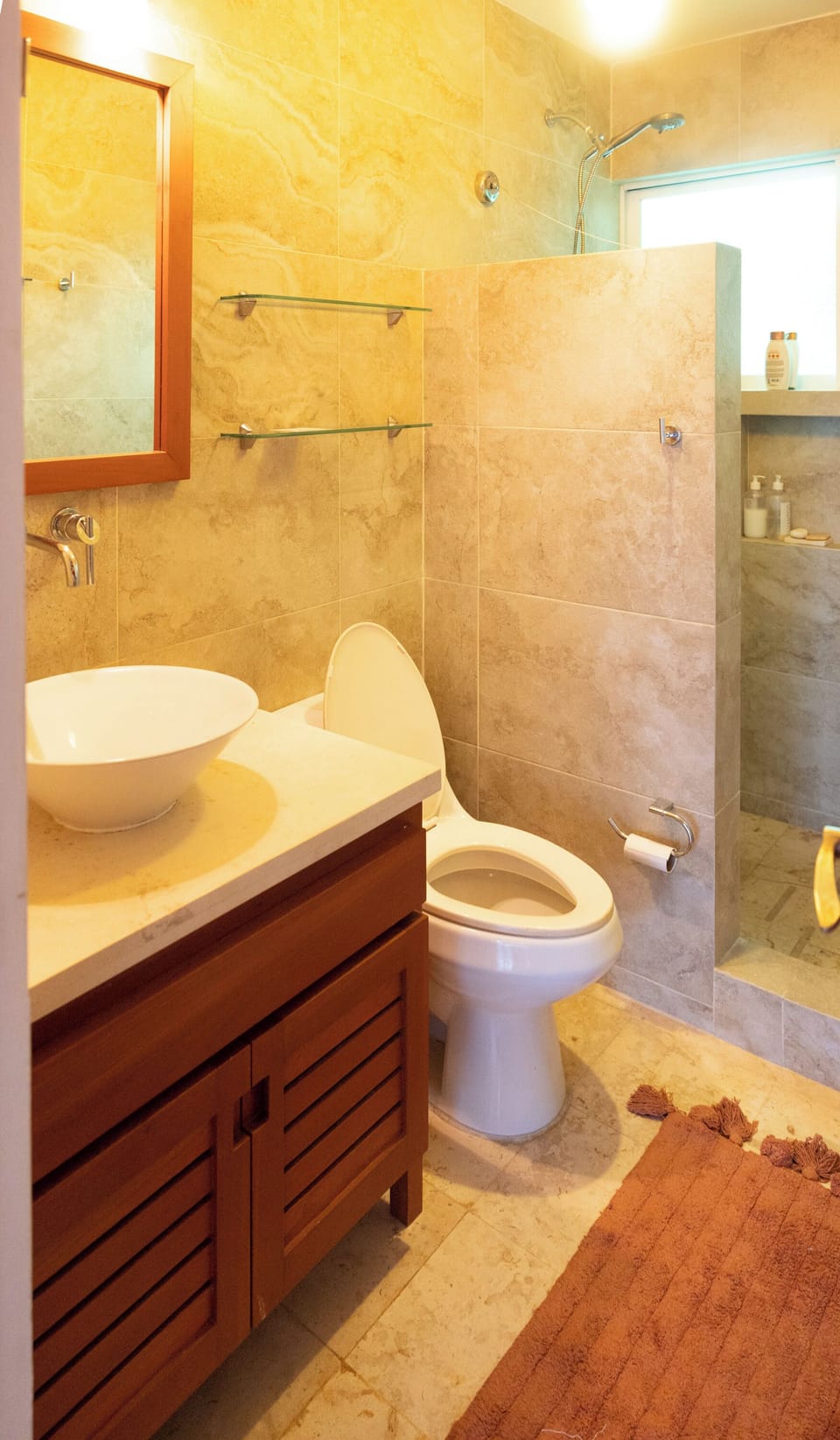 Bathroom with shower attached to upstairs master bedroom.