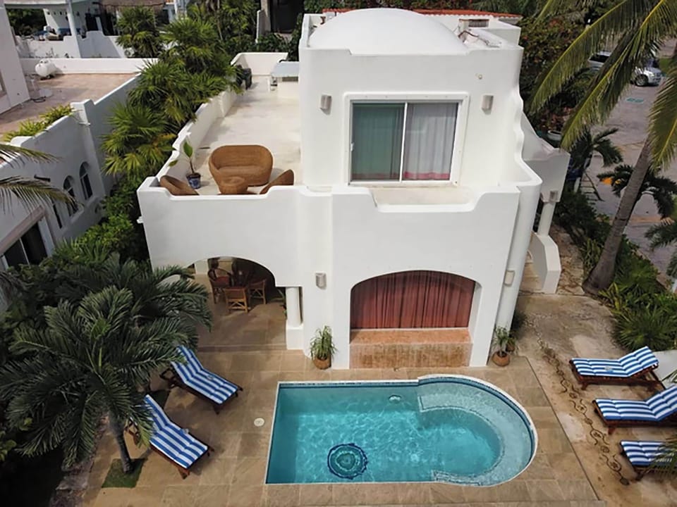 A wrap-around balcony to enjoy sunrises and sunsets with coffee.  