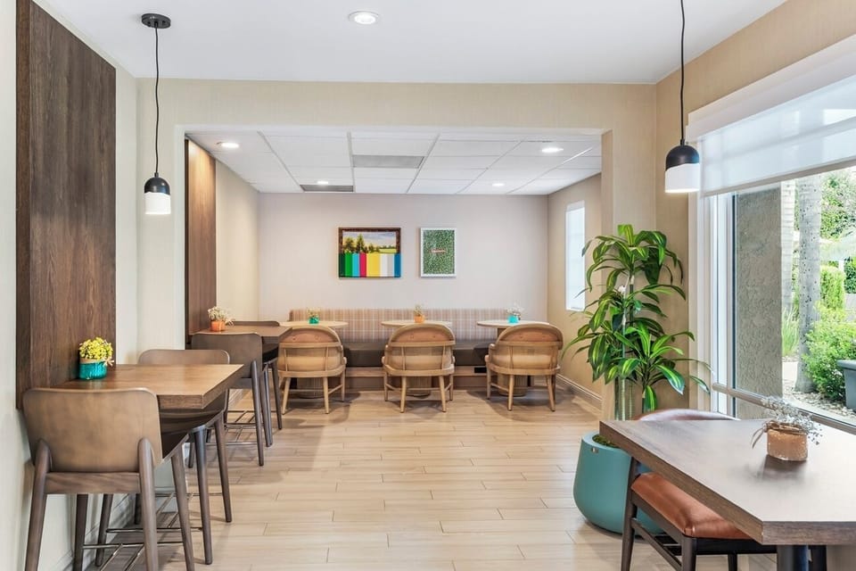 Start mornings with spacious seating and a bright breakfast spread.