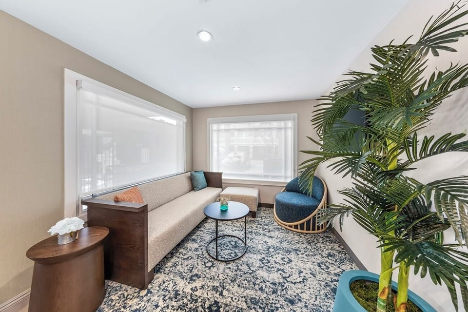 Settle in with a book in this cozy lounge nook.