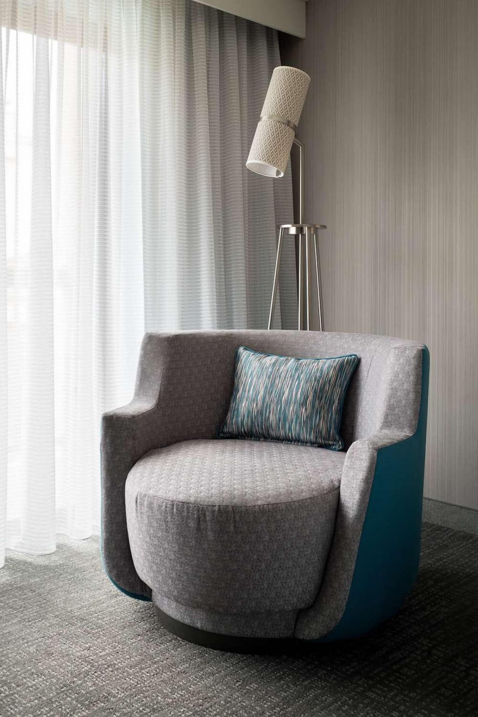 Curl up in the accent chair for a peaceful reading moment.