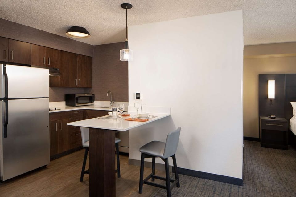 Start mornings with coffee at the sleek breakfast bar.