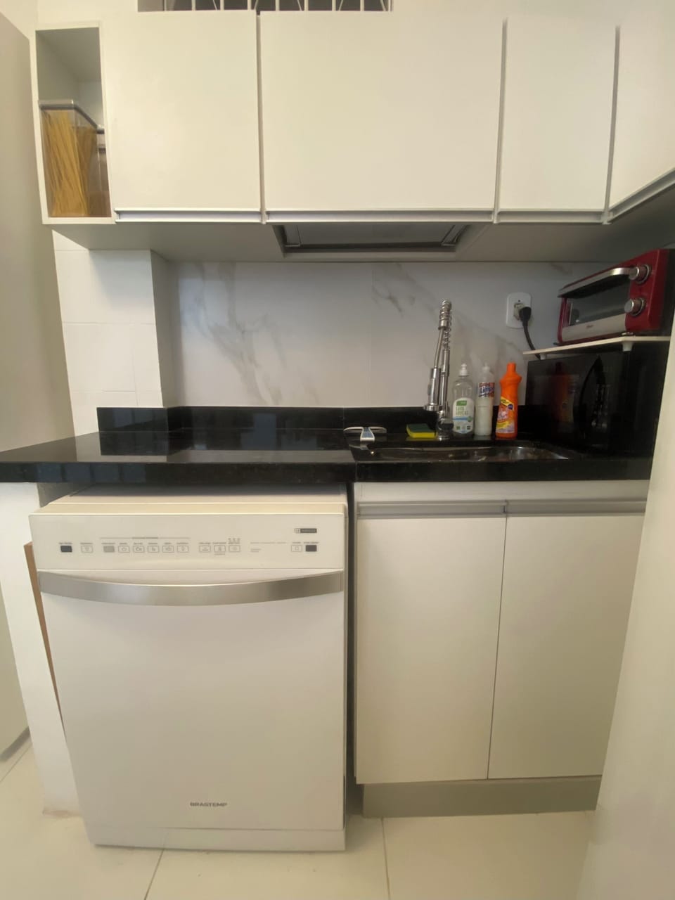 Kitchen counter with sink and dishwasher Microwave 