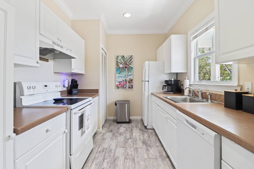 The fully equipped kitchen features ample counter space and all the essentials you need to prepare delicious meals during your stay.