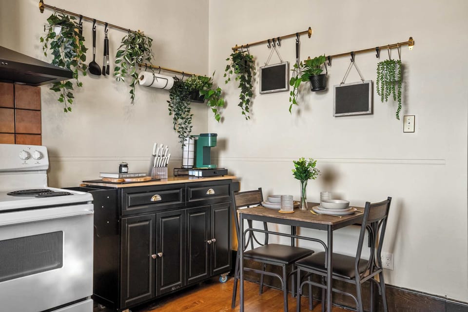 A cozy, compact kitchen featuring plenty of personality!