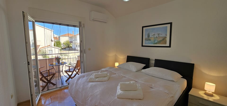 Double bedroom 2 which opens up to its private balcony