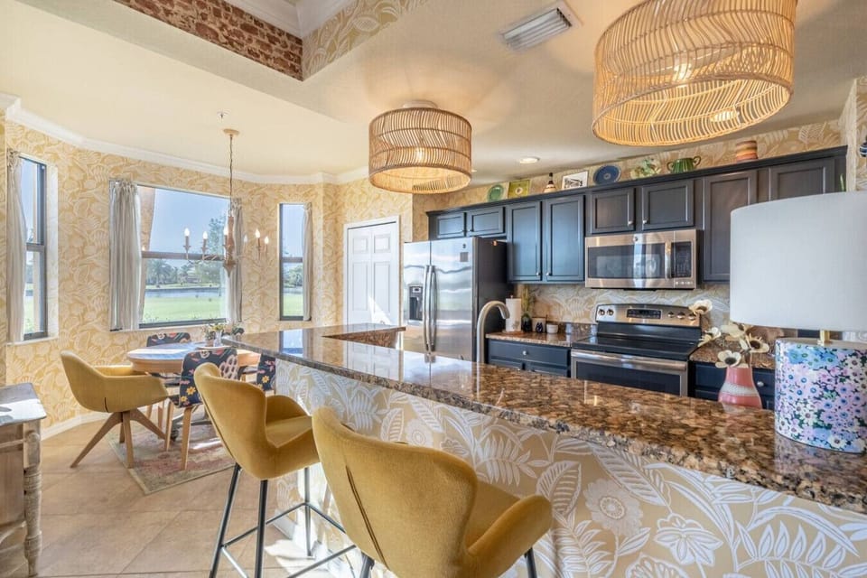 Fully equipped kitchen with modern appliances and everything you need to cook and dine in, including cookware, dishes, and utensils. Perfect for preparing meals at home!