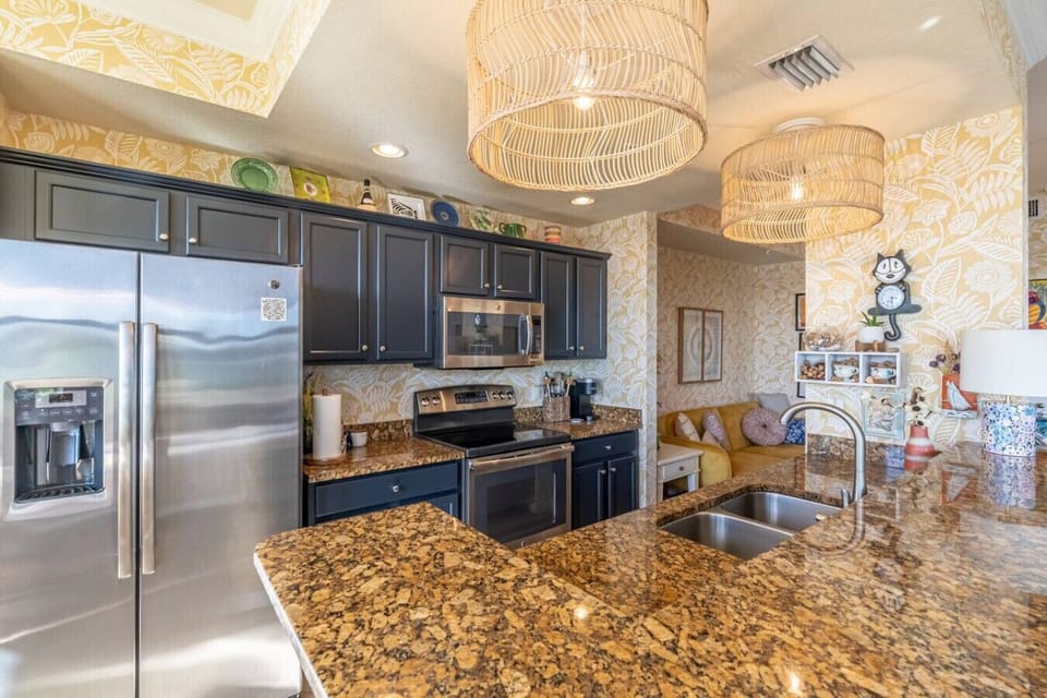Fully equipped kitchen with modern appliances and everything you need to cook and dine in, including cookware, dishes, and utensils. Perfect for preparing meals at home!