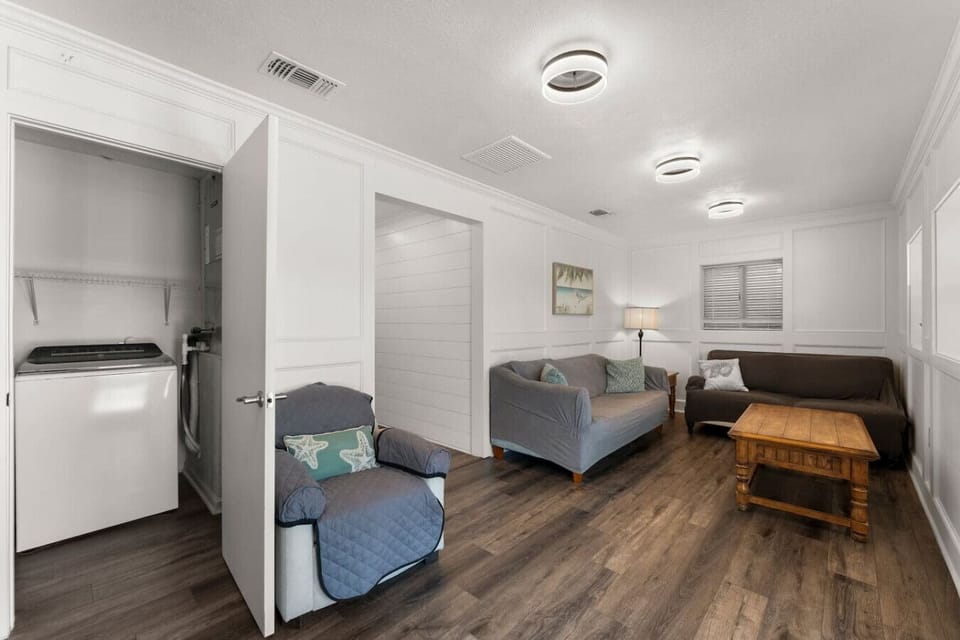 Relax in the cozy living room with comfortable seating, and take advantage of the convenient in-unit washer and dryer