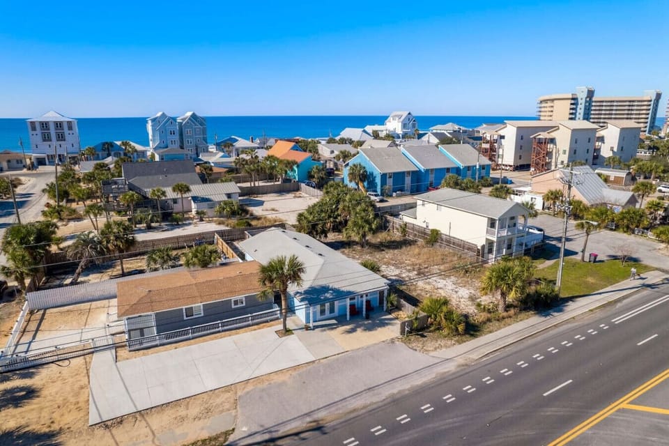 Prime beachside location just steps to the shore, offering stunning coastal views and easy access to dining, shopping, and local attractions