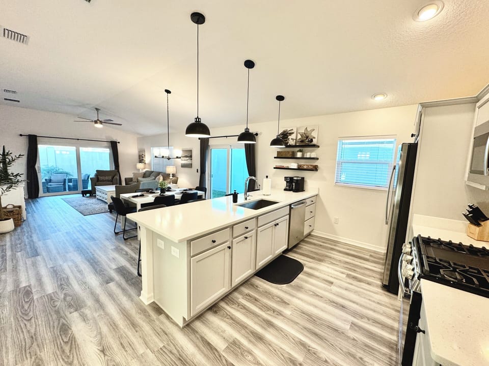 Open Concept: Living Room, Dining and Kitchen
