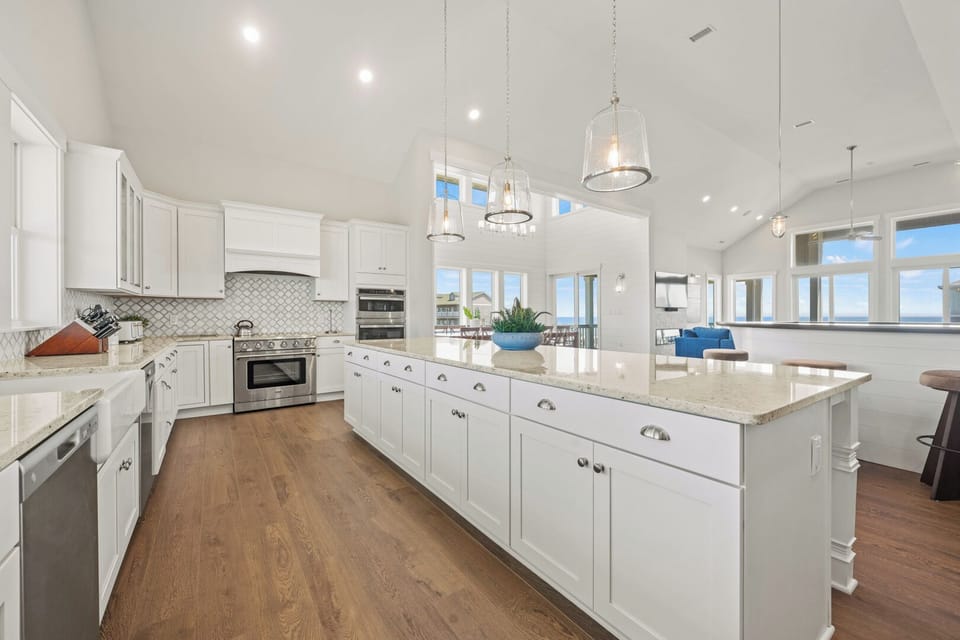 Large Kitchen with Bar Seating and Dual Refrigerators on Fourth Level