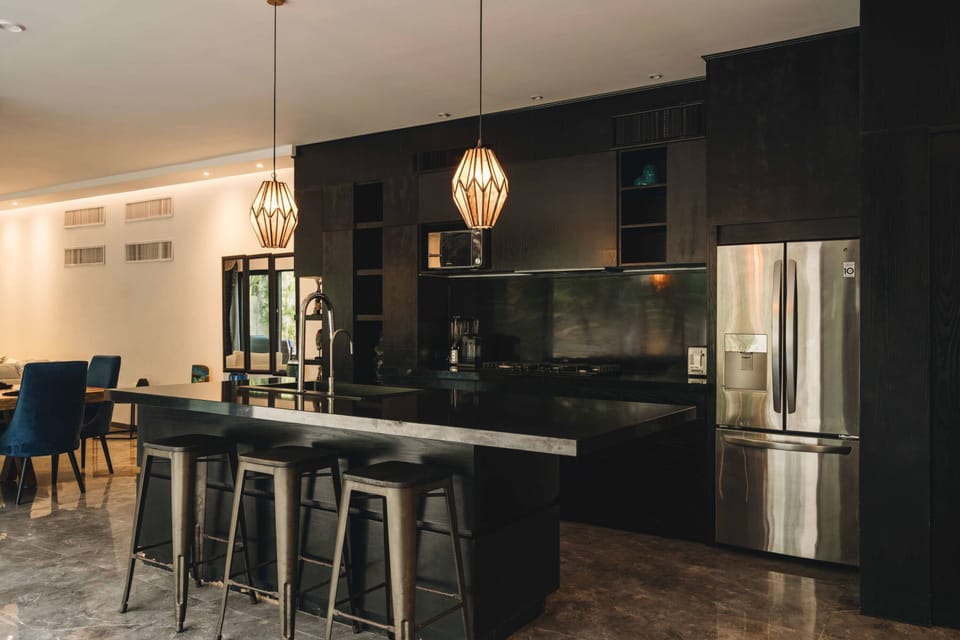 Modern kitchen, fully equipped. Features a fantastic breakfast bar.